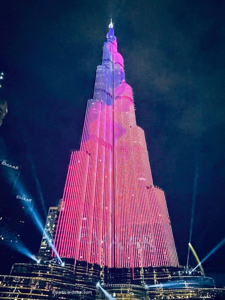 Burj Khalifa lit up in pink at night