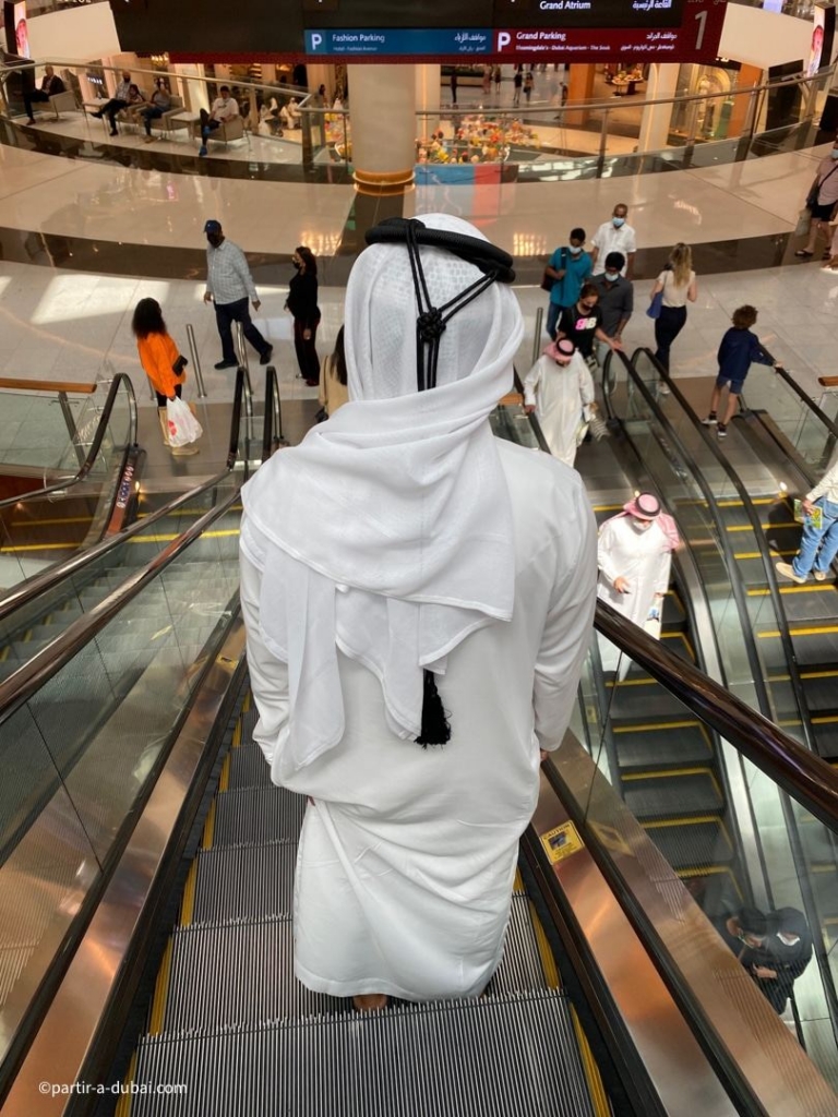 Men in Dubai wear a white turban called a 'dishdasha'