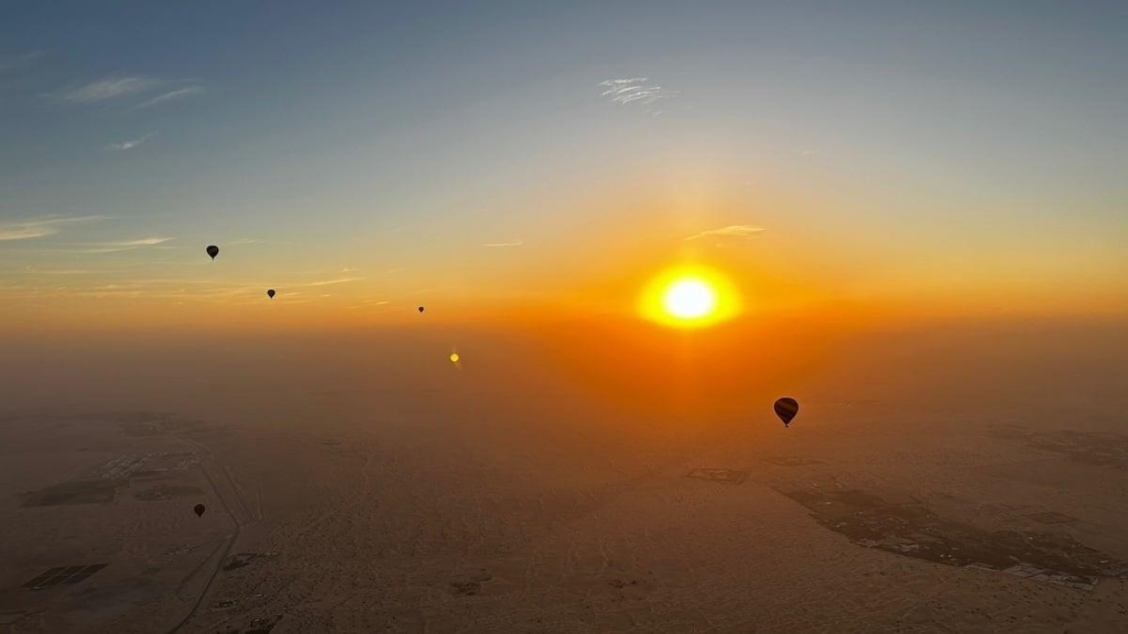 Sunrise from a hot air balloon in the Dubai desert